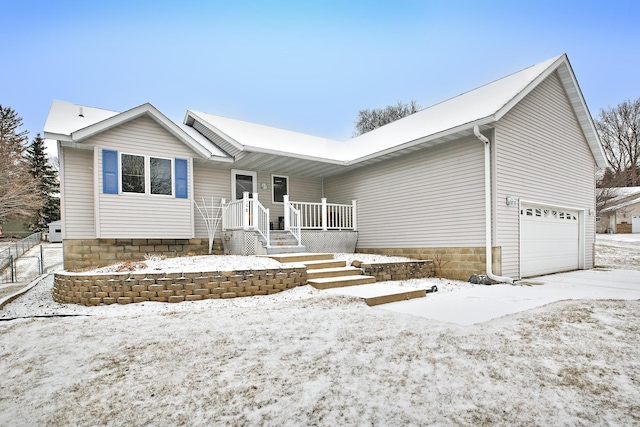 single story home featuring a garage