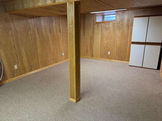 basement featuring light carpet