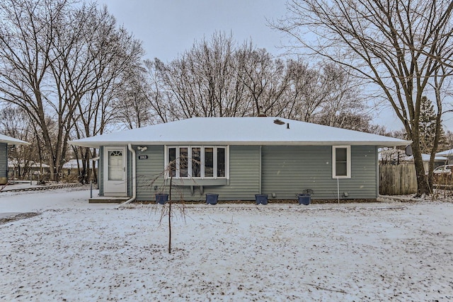 view of snow covered property