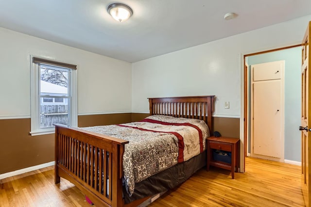 bedroom with light hardwood / wood-style flooring