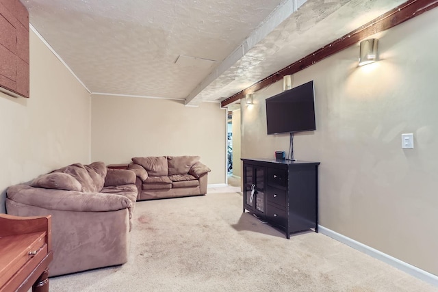 living room with beamed ceiling, light colored carpet, and a textured ceiling