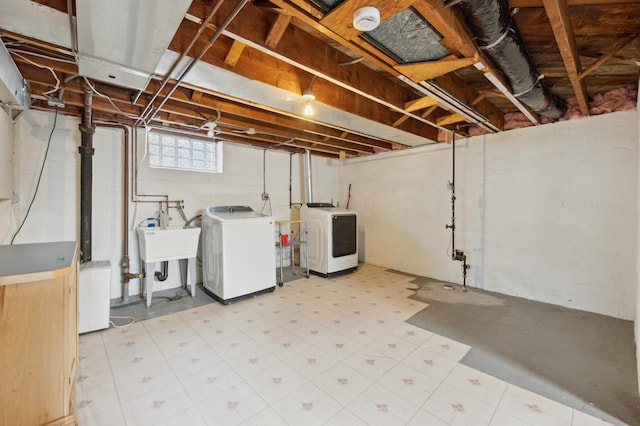 basement with separate washer and dryer