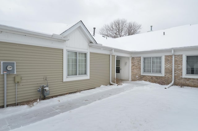 view of snow covered property