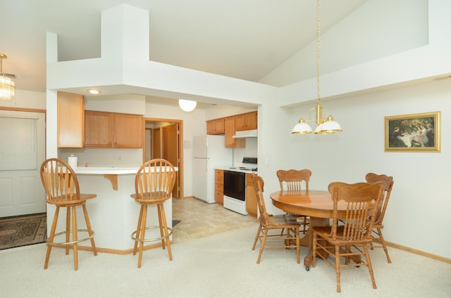 carpeted dining space with high vaulted ceiling and a notable chandelier