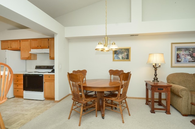 carpeted dining space with vaulted ceiling and a chandelier