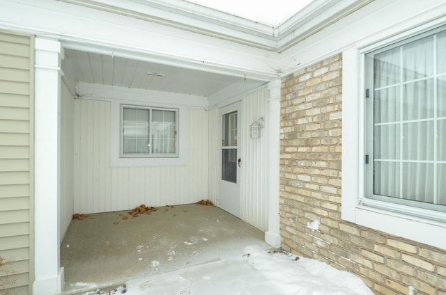 entrance to property with a patio area