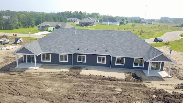 back of property with a patio area