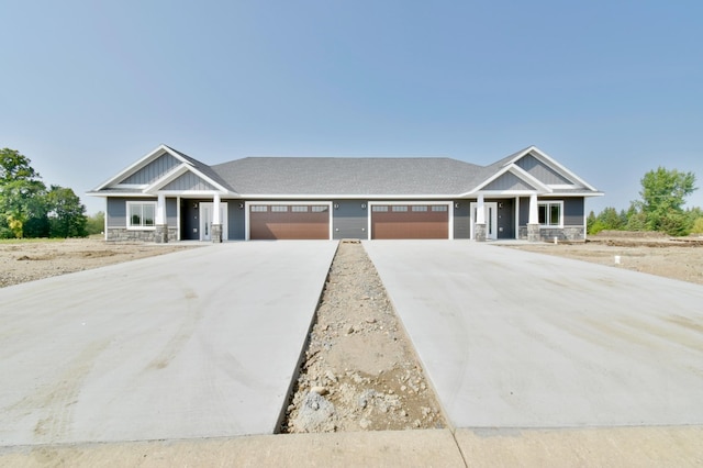 craftsman-style house with a garage