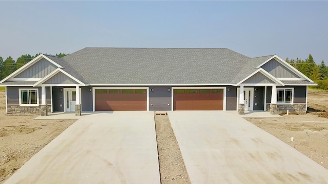 craftsman inspired home featuring a garage