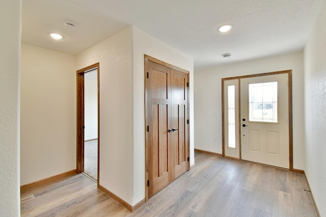 foyer featuring light hardwood / wood-style flooring