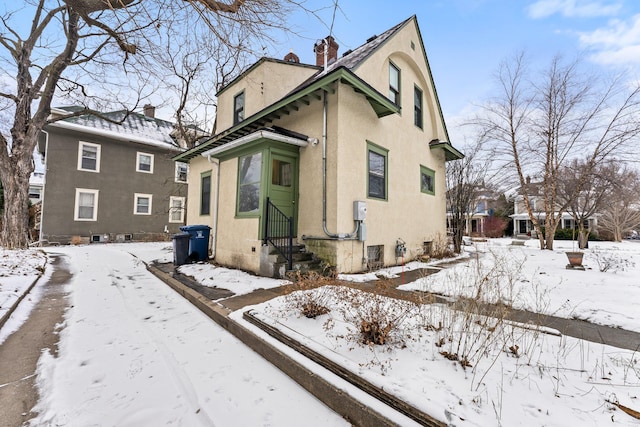 view of snow covered exterior