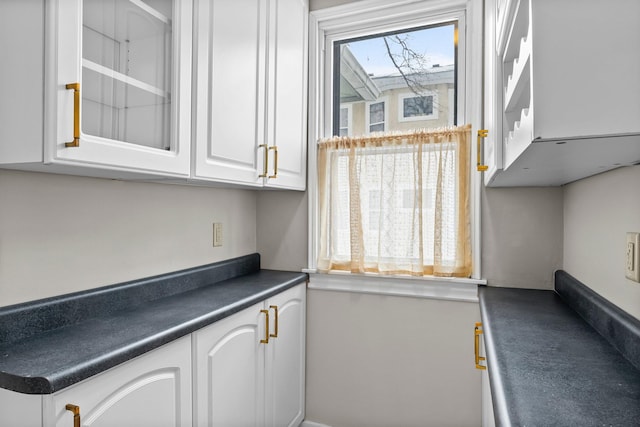 kitchen with white cabinetry