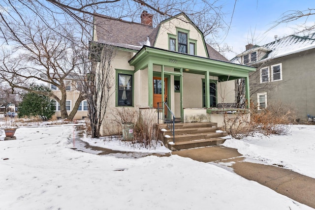 view of front of property featuring covered porch