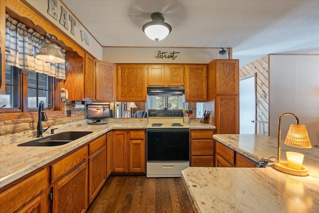 kitchen with dark wood-type flooring, sink, a textured ceiling, electric stove, and light stone countertops