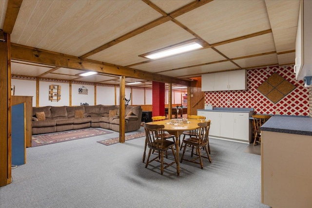 view of carpeted dining area