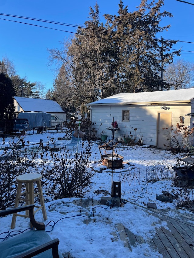 view of yard covered in snow