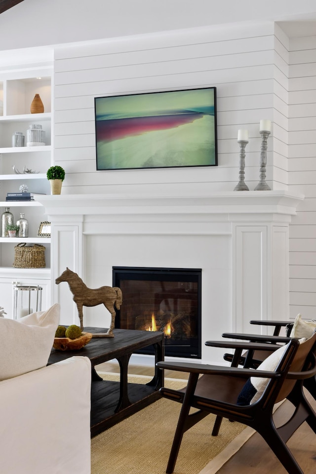 sitting room with built in shelves