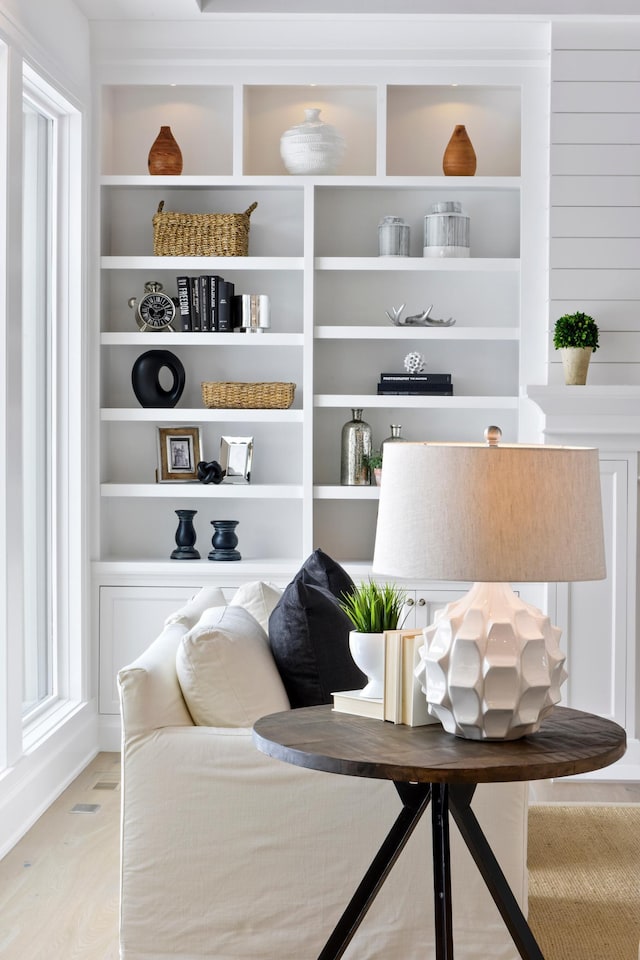 living area with light hardwood / wood-style flooring