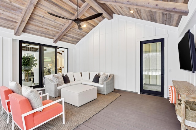 living room with vaulted ceiling with beams, ceiling fan, hardwood / wood-style floors, and wood ceiling