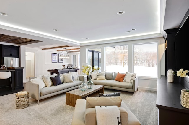 living room with light carpet, a chandelier, and billiards