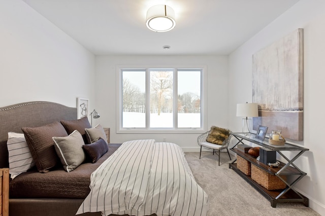 bedroom with light colored carpet