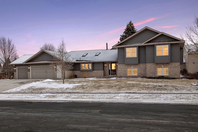 view of front of home with a garage