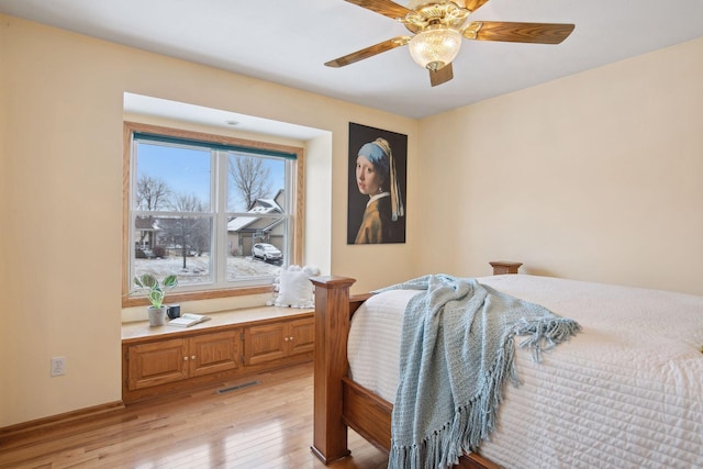 bedroom featuring ceiling fan and light wood-type flooring