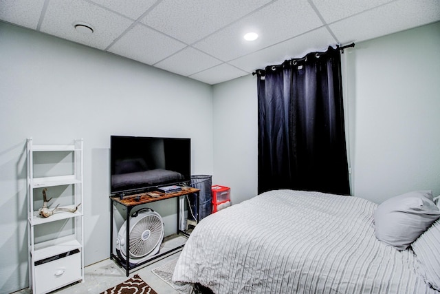 bedroom featuring a drop ceiling