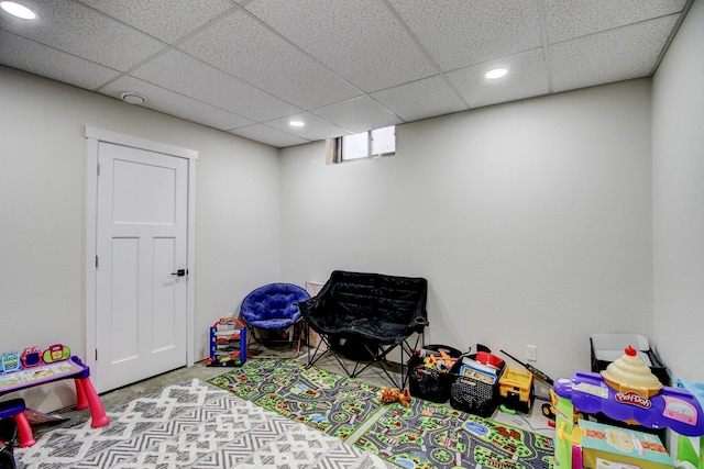 rec room featuring recessed lighting and a drop ceiling