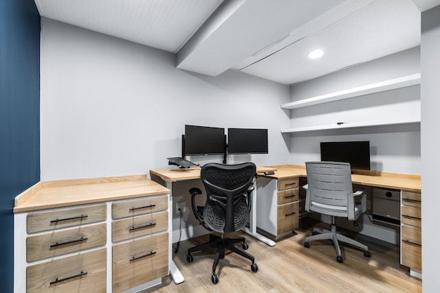 office space with light hardwood / wood-style flooring