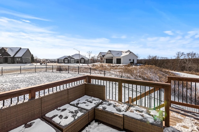 view of snow covered deck