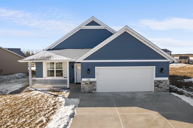 view of front of house featuring a garage and covered porch