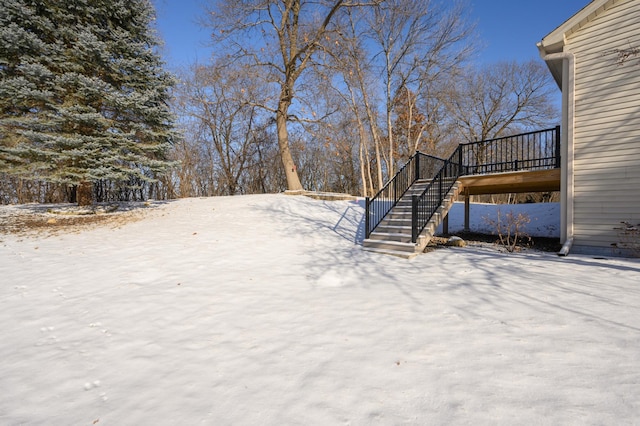 view of yard layered in snow