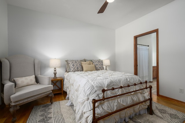 bedroom featuring ceiling fan and light wood-type flooring