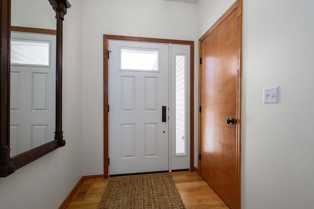 entrance foyer with light hardwood / wood-style flooring