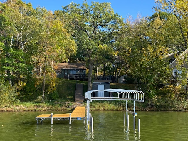 dock area featuring a water view