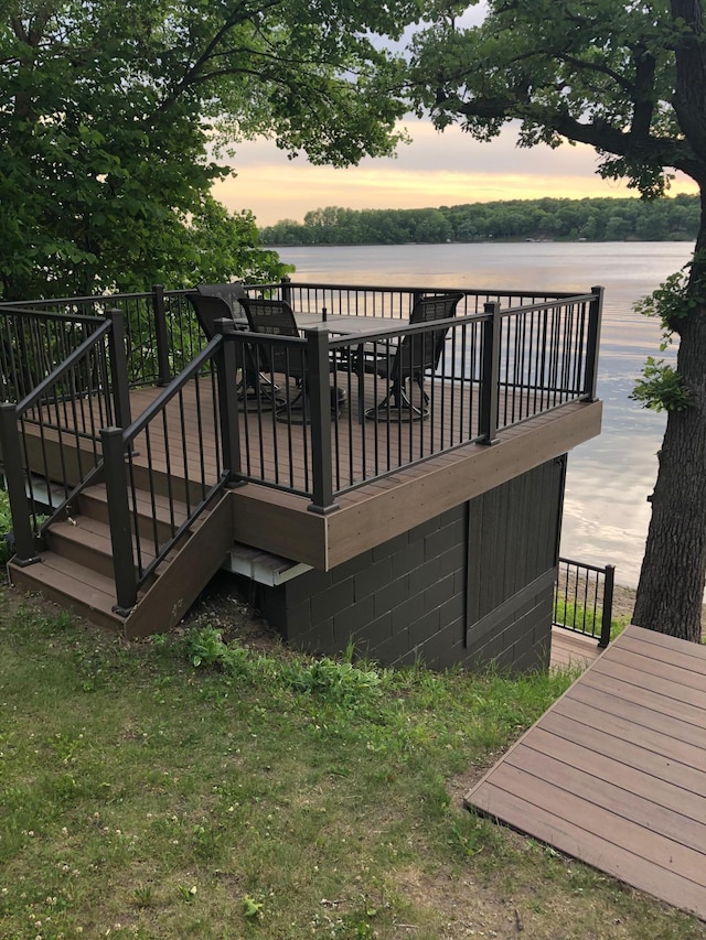 deck at dusk with a water view