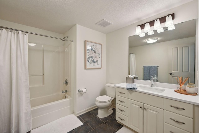 full bathroom with toilet, shower / tub combo, tile patterned floors, a textured ceiling, and vanity