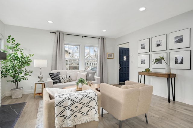 living room with light hardwood / wood-style flooring