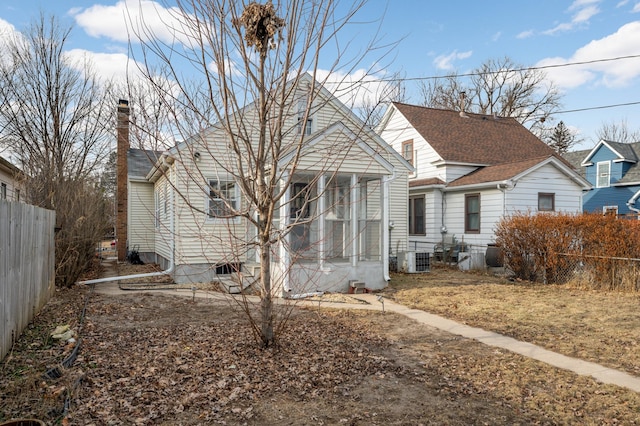 bungalow-style home featuring central AC unit