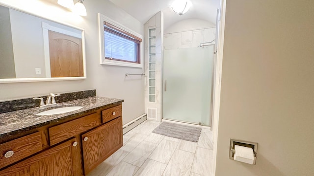 bathroom with vanity, visible vents, a shower stall, vaulted ceiling, and baseboard heating