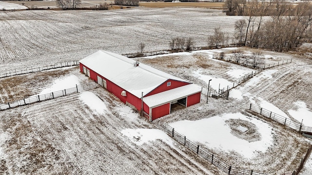 snowy aerial view with a rural view