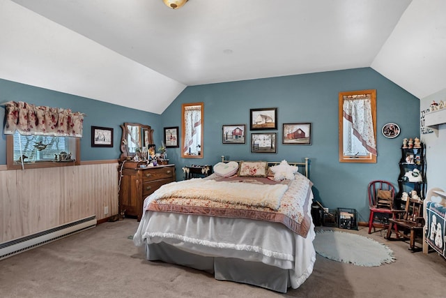 carpeted bedroom with lofted ceiling and a baseboard radiator