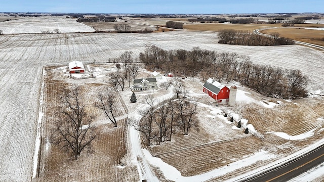 snowy aerial view with a rural view