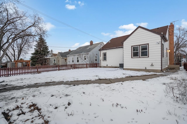 view of snow covered property