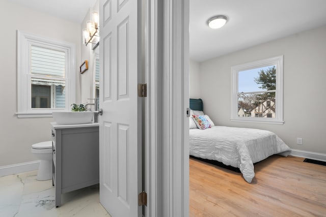 bedroom featuring sink