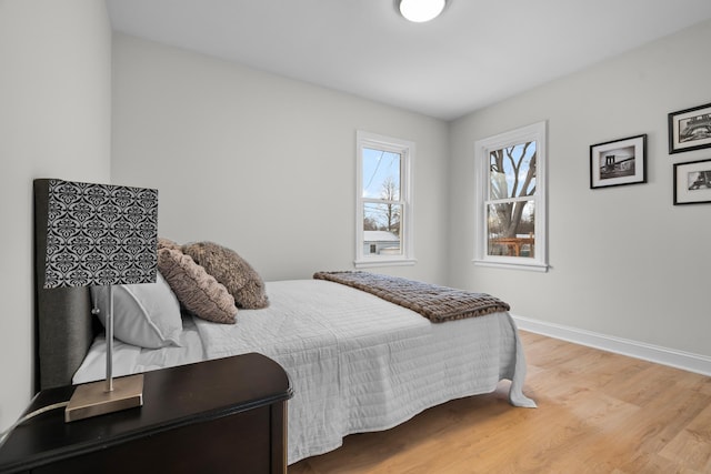 bedroom featuring light wood-type flooring