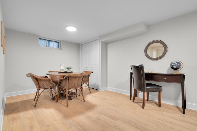 dining room with light wood-type flooring