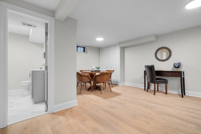 dining space featuring light hardwood / wood-style flooring