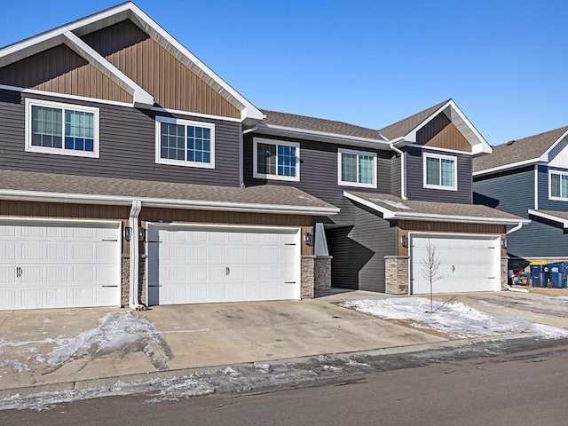 view of front of property with a garage